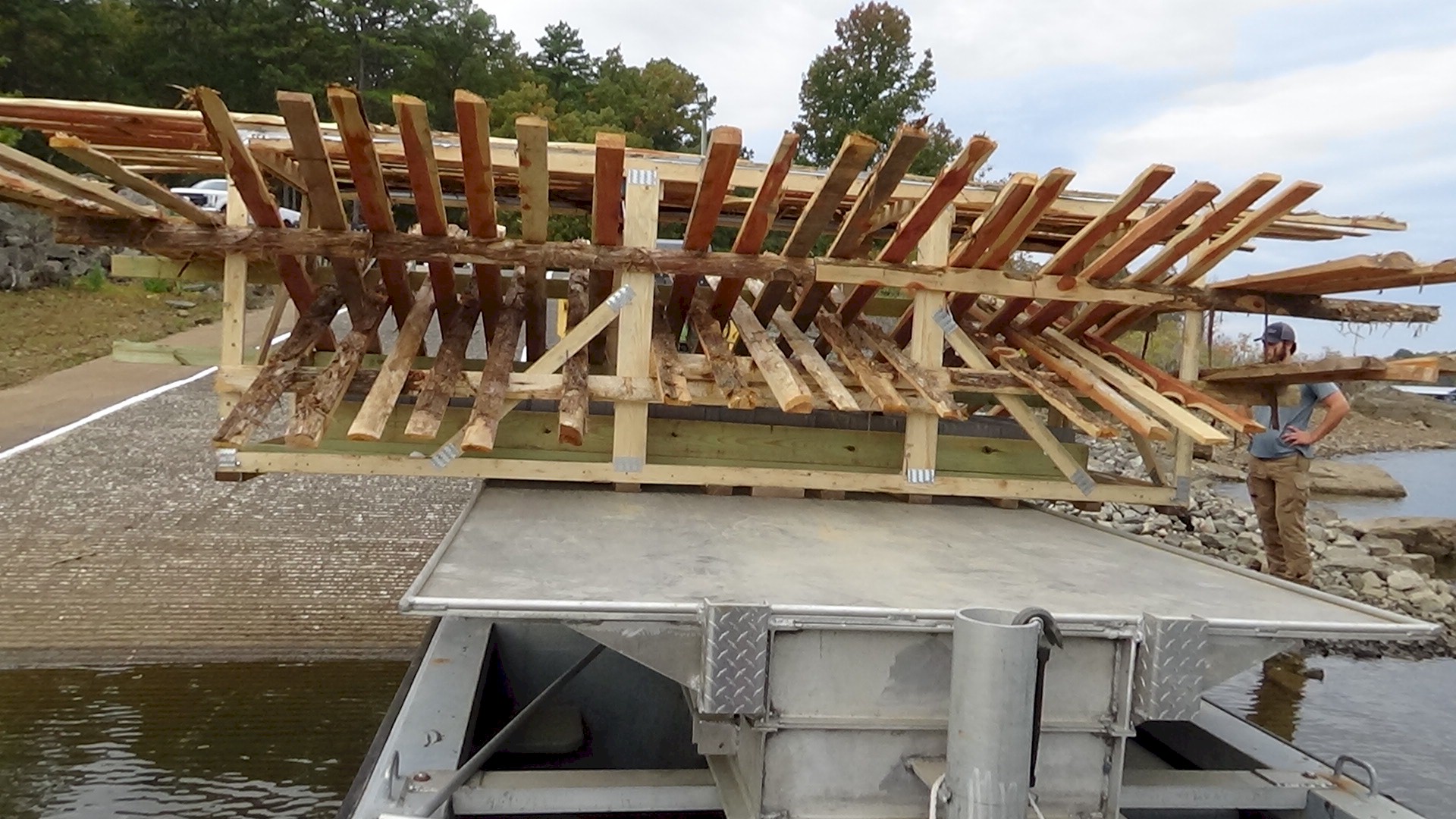 loading-skidoo crates-fish-structures-greers-ferry-lake-walleye-club